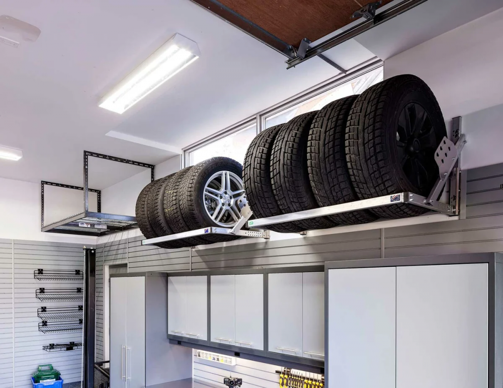 Способы хранения шин в гараже: крепления на стену и не только