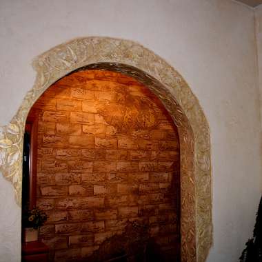 Особенности отделки арок и дверных проемов декоративным камнем